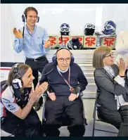  ??  ?? For the good times: Claire and Sir Frank Williams, with his wife Ginny, celebrate winning the Spanish Grand Prix in 2012 (right); (above) overseeing operations in 2017 and (far right) with her father at the Williams film premiere