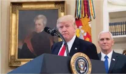  ?? | AP ?? President Donald Trump speaks with a portrait of former President Andrew Jackson behind him.