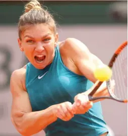  ?? GETTY IMAGES ?? Simona Halep rallied past Sloane Stephens 3- 6, 6- 4, 6- 1 to win the French Open on Saturday. Halep won her first Grand Slam in four tries.