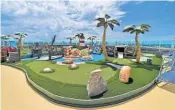  ??  ?? The miniature golf course has been upgraded. Also available: A laser tag zone and a 40-foot-long surf simulator.