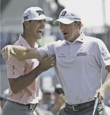  ??  ?? 0 Brandt Snedeker, right, celebrates with playing partner Billy Horschel after completing his round of 59.
