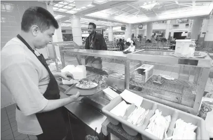  ??  ?? Hakim Yoseph, who has lasted longer than anyone else at the half-empty food court, at his Perfect Plate Persian Food.