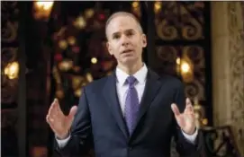  ?? ANDREW HARNIK — THE ASSOCIATED PRESS ?? Boeing CEO Dennis Muilenburg speaks to members of the media after meeting with President-elect Donald Trump at Mar-a-Lago, in Palm Beach, Fla., Wednesday.