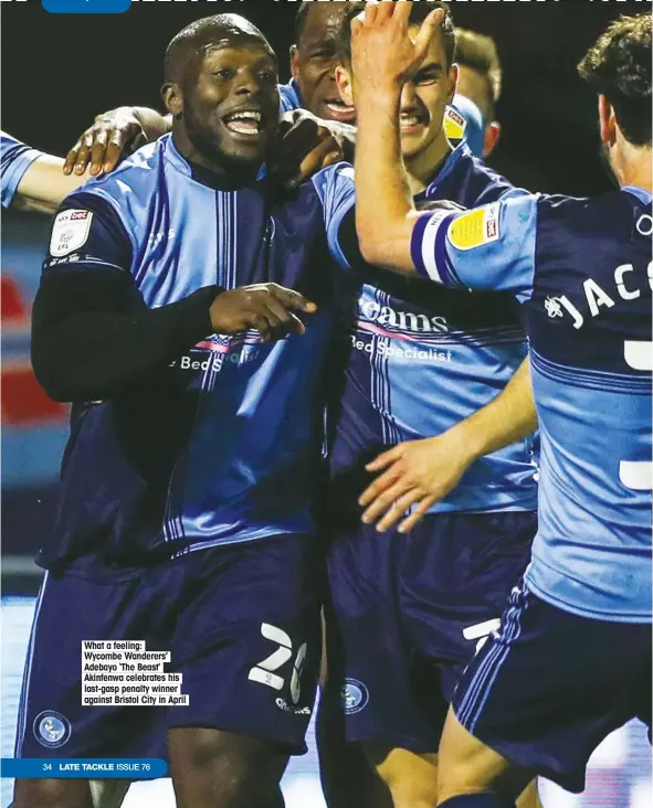  ??  ?? What a feeling: Wycombe Wanderers’ Adebayo ‘The Beast’ Akinfenwa celebrates his last-gasp penalty winner against Bristol City in April