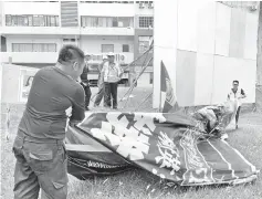  ??  ?? The banner that was taken down by EC following a police report lodged by DAP yesterday.