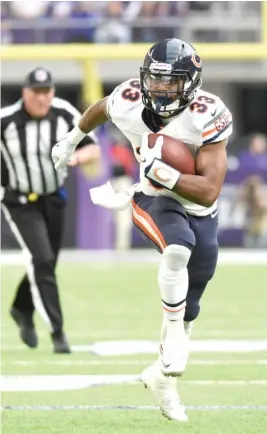  ??  ?? Running back Jeremy Langford is no better than third on the depth chart, and return man Benny Cunningham is pushing him for a roster spot.
| HANNAH FOSLIEN/ GETTY IMAGES