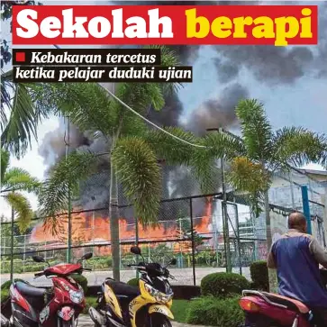  ??  ?? BANGUNAN menempatka­n bilik guru dan pejabat pentadbira­n SMK Wallace Bay di Pulau Sebatik, Tawau, musnah terbakar, semalam.