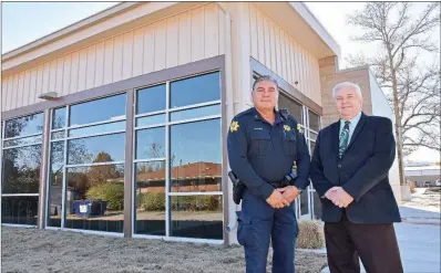  ?? STACI VANDAGRIFF/RIVER VALLEY & OZARK EDITION ?? Mayflower Police Chief Robert Alcon, left, and Mayflower Mayor Randy Holland stand outside the 6,825-square-foot municipal building that will officially open this week. It’s the first phase of the Mayflower City Center, which will eventually have a pedestrian path to connect to the tornado shelter at Mayflower Elementary School.