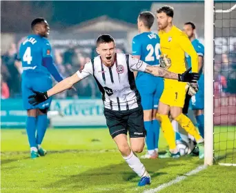  ?? ?? Josh Kelly celebrates his winning goal in Maidenhead United's 3-2 victory over Chesterfie­ld at York Road, a result that lifts them seven points clear of the bottom three. Photo credit: Darren Woolley.