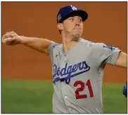  ?? (AP/Tony Gutierrez) ?? Los Angeles Dodgers starting pitcher Walker Buehler allowed 1 run on 3 hits and struck out 10 over 6 innings Friday in the Dodgers’ victory over the Tampa Bay Rays in Game 3 of the World Series at Arlington, Texas.