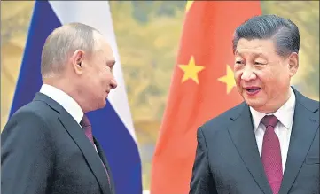  ?? ?? Russian President Vladimir Putin (left) attends a meeting with Chinese President Xi Jinping in Beijing, China.