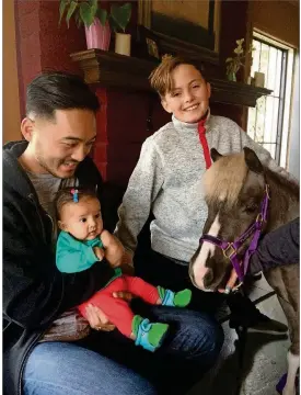  ?? CONTRIBUTE­D BY JORDAN MOON ?? Jordan Moon’s family had a miniature horse visit her stepfather’s home when she returned after he died from a stroke. Her family, including her children, enjoyed the visit from Tori. It helped her be able to go home again.