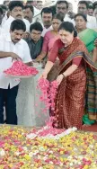  ?? — AFP ?? V K Sasikala pays her respects at the memorial for Jayalalith­aa before leaving to surrender to authoritie­s, following a Supreme Court ruling, in Chennai on Wednesday.