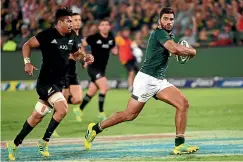  ?? GETTY IMAGES ?? Damian de Allende and the Springboks had the All Blacks on the run for much of the test, but New Zealand found a way to snatch a win.