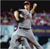  ?? JEFF ROBERSON/AP ?? Marlins starter Jeff Locke gave up 11 runs in 2 2/3 innings in Monday’s game with the Cardinals.