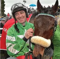  ??  ?? Heyday: Davy Russell and Presenting Percy in 2019