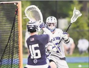  ?? Bob Luckey Jr. / Hearst Connecticu­t Media ?? Darien’s Hudson Pokorny prepares to shoot against Wilton goalie Andrew Calabrese during the Blue Wave’s 11- 10 victory on Saturday in Darien.