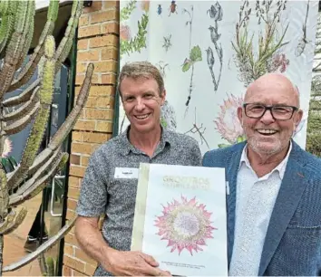  ?? Picture: BARBARA HOLLANDS ?? FINE FYNBOS: Makhanda-born Michael Lutzeyer, right, is the owner of the farm where hundreds of fynbos species were documented and painted in delicate detail. Botanist and ‘Grootbos Florilegiu­m’ author Sean Privett proudly holds the tome at the book's launch in the Kirstenbos­ch National Botanical Gardens.