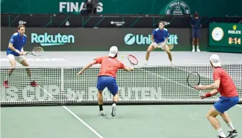  ?? — AFP photos ?? Czech Republic’s Jiri Lehecka (right) and Tomas Machac play against France’s Pierre-Hugues Herbert and Nicolas Mahut (left) during the men’s doubles group stage match of the Davis Cup in Innsbruck, Austria.