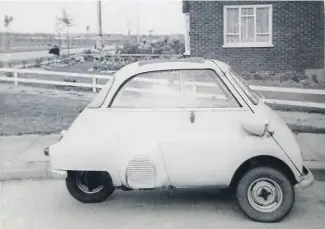  ??  ?? My 1956 Isetta – it was bright yellow!