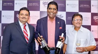  ??  ?? (From left to right) Sumedh Mandla, Vijay Amritraj and Ravi Jain, promoter and distributo­r, Grover Zampa Vineyards.