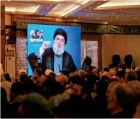  ?? Reuters ?? Hezbollah leader Hassan Nasrallah addresses his supporters during a rally in Jebshit village, southern Lebanon. —