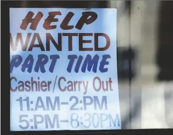  ?? AP PHOTO/NAM Y. HUH on Jan. ?? A help wanted sign is displayed at a restaurant in Arlington Heights, Ill., 30.