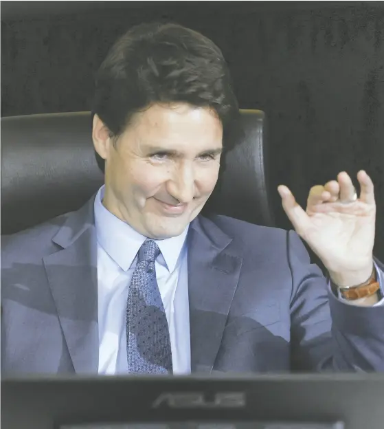  ?? BLAIR GABLE / REUTERS FILES ?? Prime Minister Justin Trudeau reacts as he prepares to testify at the Public Order Emergency Commission in Ottawa.
His performanc­e gave the impression of a confident leader who can think on his feet, says Rupa Subramanya.