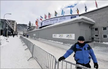  ?? PHOTO: ELMOND JIYANE ?? The South African flag flies high among the flags of nations at the World Economic Forum in Davos, Switzerlan­d. President Jacob Zuma leads a South African delegation of cabinet ministers and business leaders to the meeting.