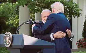  ??  ?? US President Donald Trump hugging Indian Prime Minister Narendra Modi at the White House on Monday. EPA PIC