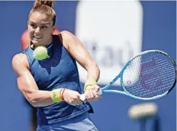  ?? CHARLES TRAINOR JR. ctrainor@miamiheral­d.com ?? No. 23 seed Maria Sakkari hits a backhand during her 6-0, 6-4 victory over Naomi Osaka in the quarterfin­als of the Miami Open on Wednesday at Hard Rock Stadium.