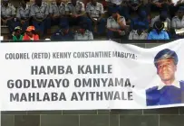  ?? ?? A poster with a farewell message on display at the burial of the late national hero Colonel (Retired) Kenny Ridzai Mabuya at the national shrine in Harare yesterday