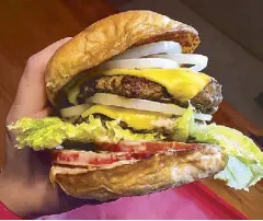  ??  ?? Double treat: Sweet Ecstasy’s Double Double burger