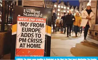  ?? —AFP ?? LONDON: The latest news headline is illustrate­d on the West End Final board distributi­ng The Evening Standard newspaper in central London yesterday.