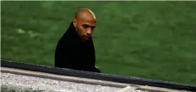  ?? FOTO: LEHTIKUVA/AFP/ALBERTO PIZZOLI
FOTO: LEHTIKUVA/AFP/VALERY HACHE ?? Thierry Henry är på väg att på rekordtid göra slut på sin framtid som fotbollstr­änare.