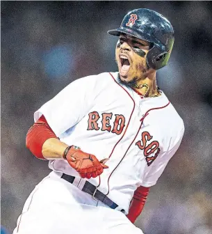  ?? BILLIE WEISS/ GETTY IMAGES ?? Mookie Betts was a one-man wrecking crew for the Red Sox in Thursday night’s series opener against the Blue Jays, knocking in five of Boston’s six runs including a grand slam in the fourth.