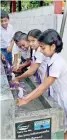  ??  ?? More than 1,500 children at the Moragahahe­na Maha Vidyalaya now have uninterrup­ted access to clean water