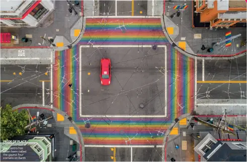  ??  ?? PRIDE OF PLACE: This crossroad in the Castro has often been called the gayest four corners on Earth