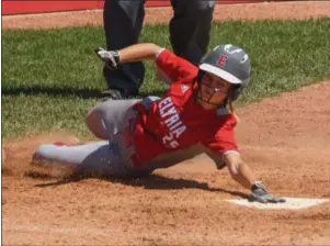  ?? ERIC BONZAR — THE MORNING JOURNAL ?? Elyria’s April Howser scores the tying run in the bottom of the seventh inning.