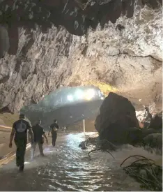  ?? (Courtesy of Elon Musk via AP) ?? THAILAND. This photo tweeted by Elon Musk shows efforts underway to rescue trapped members of a youth soccer team from a flooded cave in northern Thailand. Musk tweeted early Tuesday, July 10, 2018, he has visited the cave and has left a mini-submarine...