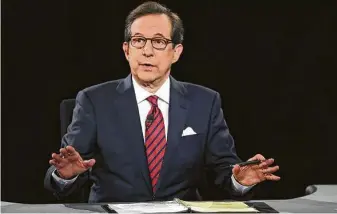  ?? Joe Raedle / Associated Press file photo ?? ChrisWalla­ce guides discussion during a 2016 presidenti­al debate in Las Vegas. The “Fox News Sunday” host will moderate today’s debate between President Donald Trump and Joe Biden.