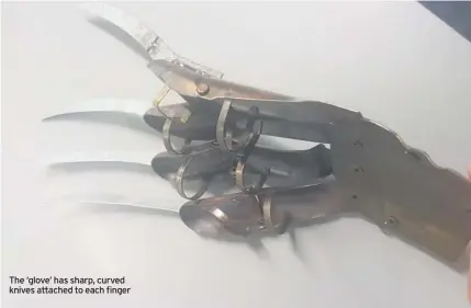  ??  ?? The ‘glove’ has sharp, curved knives attached to each finger