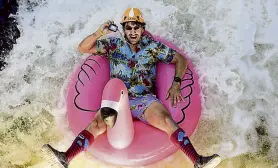  ?? Cliff Grassmick, Daily Camera file ?? A tuber takes on the whitewater of Boulder Creek during Tube to Work Day in Boulder in 2019.