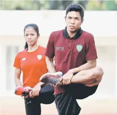  ?? — Reuters photo ?? Indonesian sprinter Lalu Mohammad Zohri (right) is seen during a daily practice ahead of the Asian Games in Jakarta.