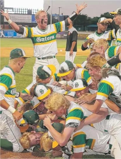  ??  ?? Crystal Lake South celebrates after winning the Class 4A title game Saturday against Edwardsvil­le. | ALLEN CUNNINGHAM/ FOR THE SUN- TIMES