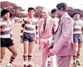  ??  ?? E.L. Bradby being introduced to the Royal team at the 100th match of the Bradby