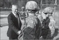  ?? The Associated Press ?? FORT BRAGG: Defense Secretary Jim Mattis greets soliders Friday at Fort Bragg, N.C.