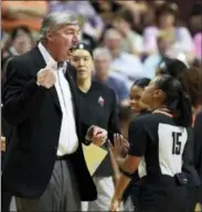  ?? SEAN D. ELLIOT — THE DAY VIA AP, FILE ?? Las Vegas Aces head coach Bill Laimbeer, left, offers his opinion on a call to official Fatou Cissoko-Stevens during the first half of a WNBA game against the Connecticu­t Sun in Uncasville, Conn.