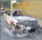  ?? AFP ?? A car burnt during a bank heist is seen in Aracatuba, 520km from Sao Paulo, Brazil.