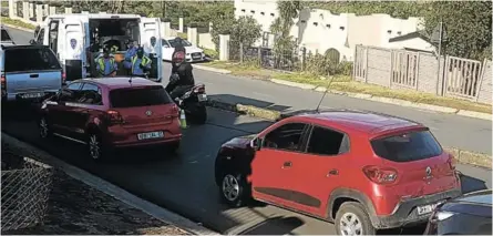  ?? Picture: THEMBELA NDLUMBINI ?? KEEPING US SAFE: The traffic department recently set up a road block between Zone 6 and Zone 7 in Zwelitsha Township, earning praise from especially senior residents